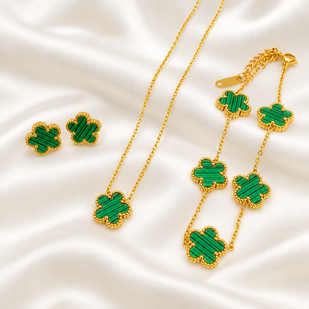 Green flower pendant necklace, bracelet and matching earrings on satin